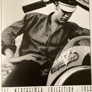 Vintage Elvis on a motorcycle print on tin.